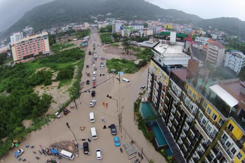 Aerial view of severe flooding in Patong, Phuket, with streets submerged and vehicles stranded, October 2026